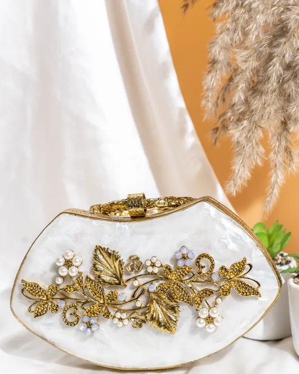 Noura_Embellished_MOP_Clutch_with_Floral_Gold_Detailing
